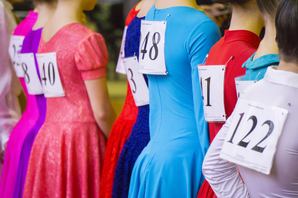 Young dancers lined up for judging at a competition