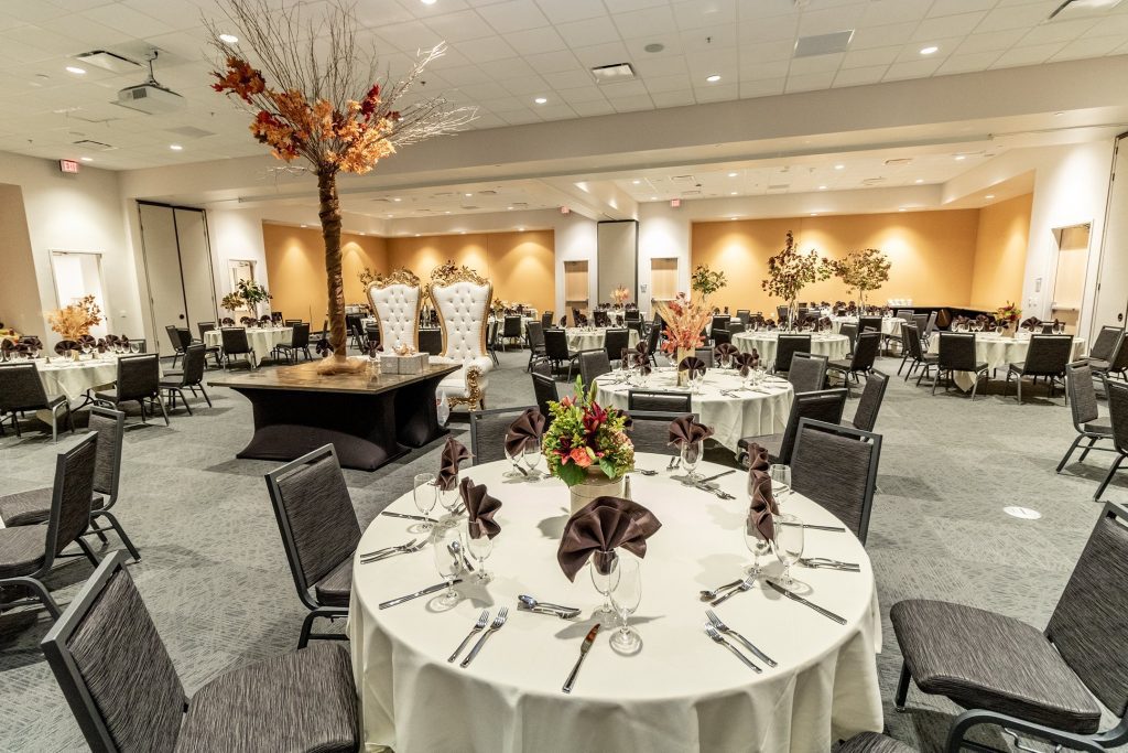 Floral arrangement and tables at Rocky Mount Event Center